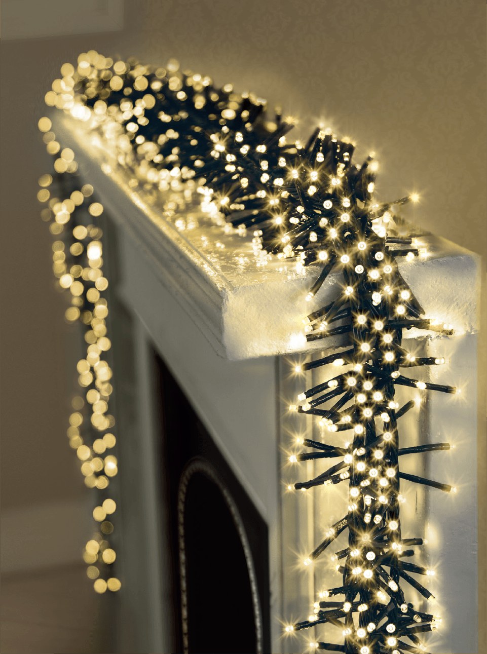 Dense warm white cluster lights on a fireplace mantel